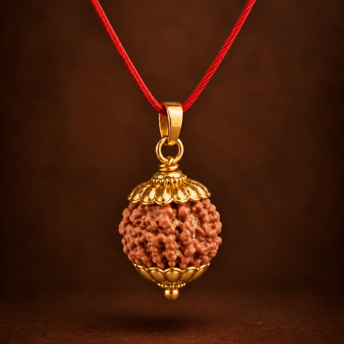 6 Mukhi Rudraksha pendant with golden-finish caps and red thread - photo 1